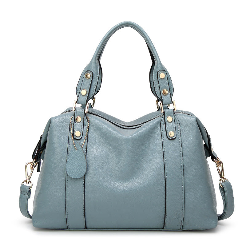 Elegant Women's Satchel Handbag with Gold-Tone Hardware and Detachable Strap