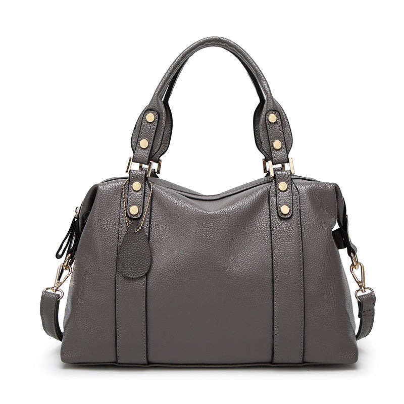 Elegant Women's Satchel Handbag with Gold-Tone Hardware and Detachable Strap