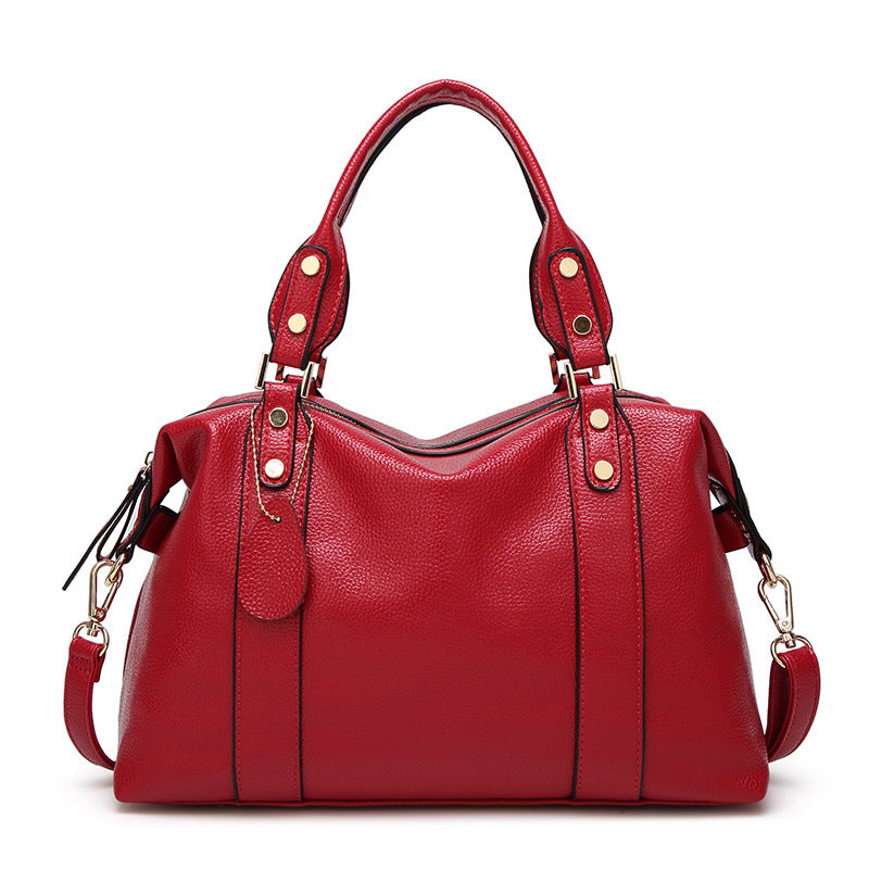 Elegant Women's Satchel Handbag with Gold-Tone Hardware and Detachable Strap